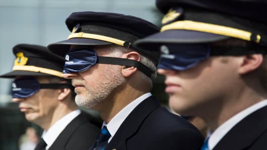 Pilots protest proposed new regulations outside the European Aviation Safety Agency in May 14, 2012 in Germany