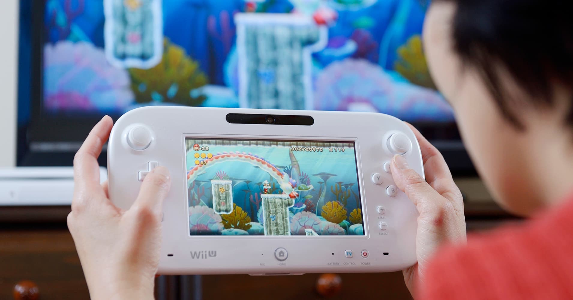 Nintendo releasing new handheld device, cheaper Wii U