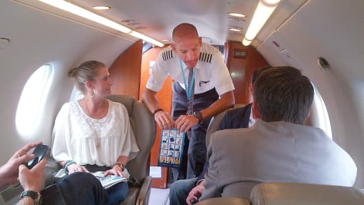 Pilot speaks with passengers on initial Surf Air flight