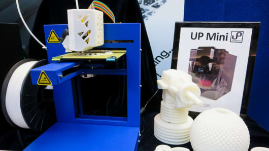 A 3-D printer on display at RAPID, an additive manufacturing conference in Pittsburgh, Pa.