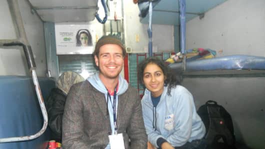 Patrick Dowd, founder of the Millennial Trains Project, with Charnita Arora on the Jagriti Yatra ride in India