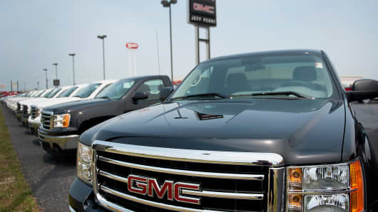 Premium: GMC Sierra truck at GMC dealership sales auto