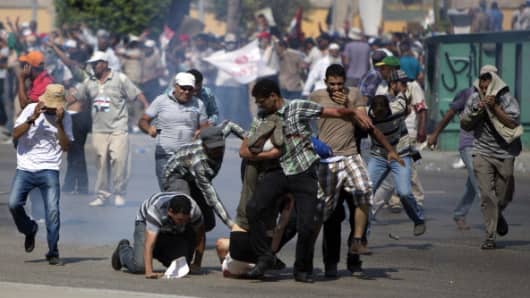 A gun battle erupted outside the Cairo headquarters of the Republican Guard
