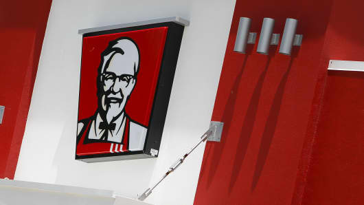 The KFC logo is displayed outside on a KFC restaurant, a unit of Yum! Brands Inc., in Houston, Texas.
