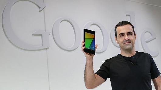 Hugo Barra, Vice President, Android Product Management at Google, holds up a new Asus Nexus 7 tablet .