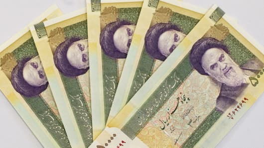 Iran's 50000 Rials with a portrait of Ayatollah Ruhollah Khomeini.