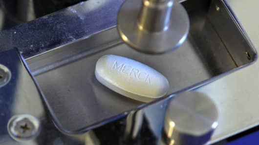 A tablets is processed at the Merck KGaA pharmaceutical plant in Darmstadt, Germany.