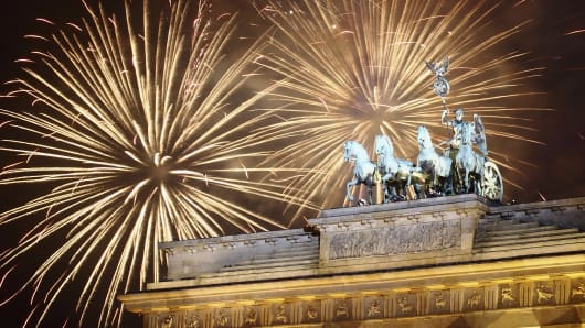 Fireworks explode over the Brandenburg Gate in Berlin, Germany