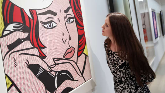 A Roy Lichtenstein hanging at Christie's in London
