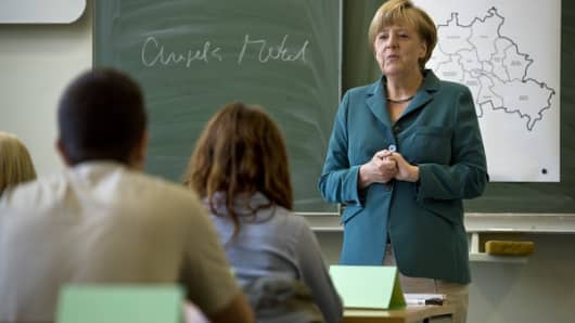 Merkel moonlights as history teacher