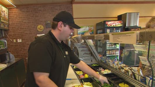 Luke Perfect, who works at a Subway franchise in Kennebunk, Maine, expects to have his hours cut because his employer says offering him health insurance under Obamacare's employer mandate is too expensive.