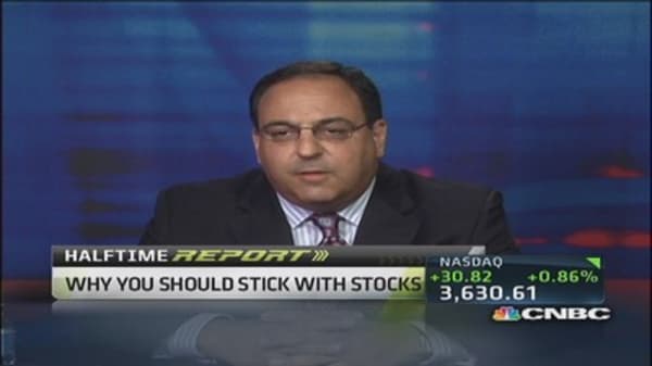 Stick with stocks through the taper: Strategist