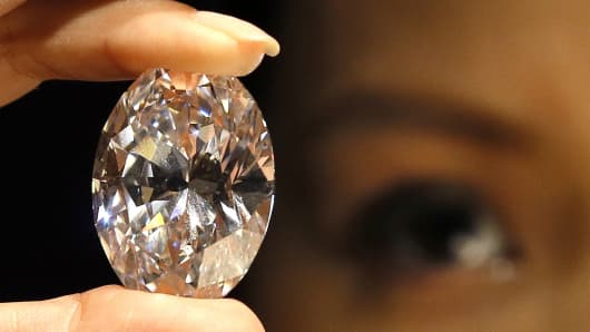 The oval white diamond that was auctioned Monday.