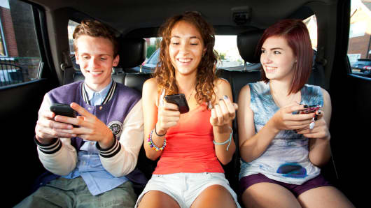 Millennials texting in car