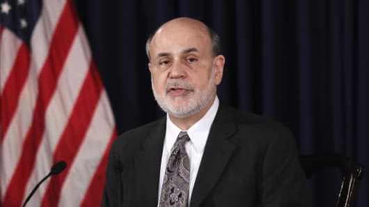 Chairman Ben Bernanke speaks after the Fed meeting in December.