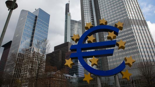 The stars of European Union (EU) membership sit on a euro sign sculpture outside the headquarters of the European Central Bank (ECB) in Frankfurt, Germany.