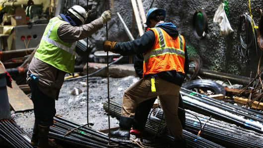 Workers in a tunnel of the Second Avenue Subway project in New York City, 2014.