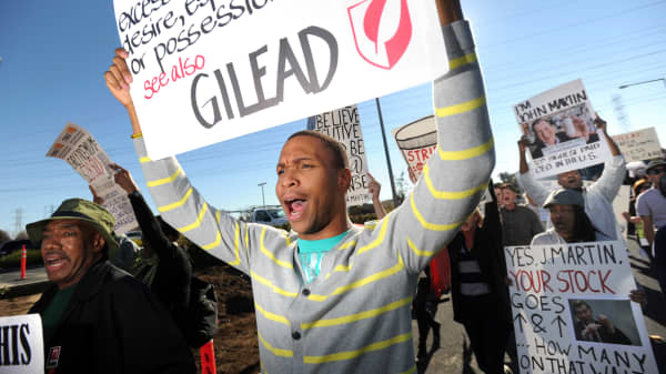 About 40 protesters from across the country converged on Gilead Sciences headquarters in Foster City, Calif., Nov. 14, 2012, calling on the drug maker to lower prices for its Stribild AIDS medication.