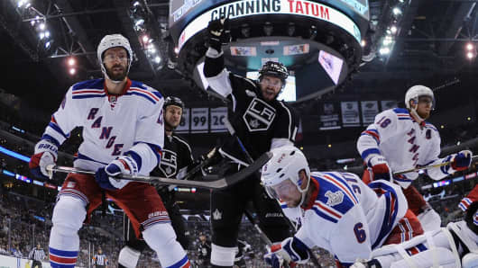 Mike Richards #10 of the Los Angeles Kings celebrates the game-winning goal by Justin Williams as the Kings defeated the Rangers 3-2 in Game One of the 2014 NHL Stanley Cup Final at the Staples Center on June 4, 2014 in Los Angeles, California.