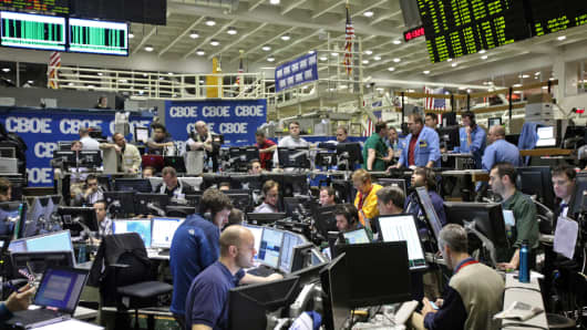 Traders work in the Volatility Index Options (VIX) pit on the floor of the Chicago Board Options Exchange (CBOE) in Chicago, Illinois, U.S.