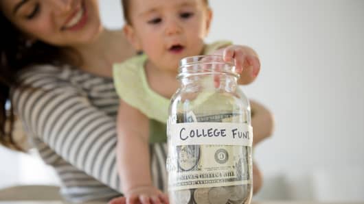 Premium: College fund mother baby jar money