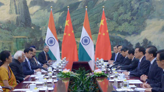 Chinese Premier Li Keqiang meets with Indian Vice President Shri Mohammad Hamid Ansari at the Great Hall of the People in Beijing on June 28, 2014.