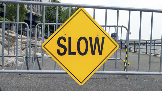 Slow sign on walkway