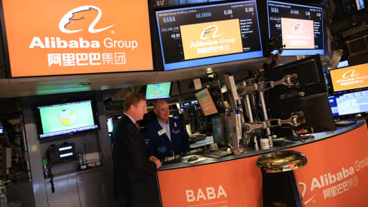 Traders on the floor of the New York Stock Exchange during Alibaba Group IPO, September 19, 2014.