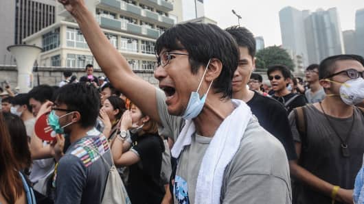 Pro-democracy demonstrators protest in front of the Government Complex in Hong Kong on Oct. 2, 2014.