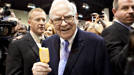 Warren Buffett eats a Dairy Queen ice cream bar prior to the Berkshire Hathaway annual meeting in Omaha, Nebraska.