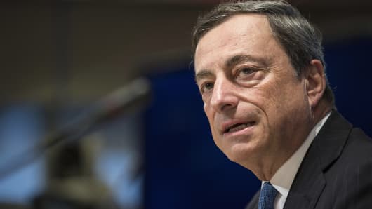 European Central Bank Governor Mario Draghi speaks at a news conference during the World Bank/IMF annual meetings in Washington, Oct. 11, 2014.