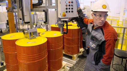 Barrels are filled with oil at a Royal Dutch Shell lubricants blending plant in Torzhok, Russia.