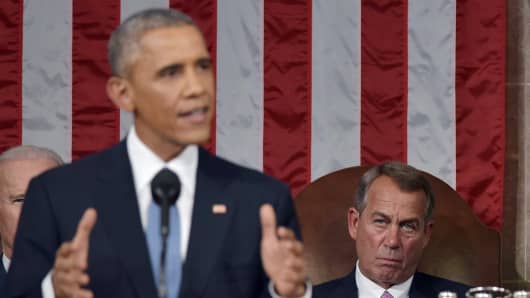 Speaker of the House John Boehner (R) listens to President Barack Obama deliver the State of the Union address on January 20, 2015 in the House Chamber of the U.S. Capitol in Washington, DC.