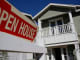 Open House signage is displayed outside of a home for sale in Redondo Beach, California.