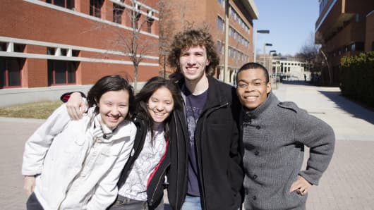 Team HueBotics, a video-game development team at UMBC, is among the final four student teams competing to represent the U.S. in the Games division of the 2015 Microsoft Imagine World Cup competition. The teammates are (l. to r.) Jasmin Martin, Erika Shumacher, Tad Cordle, and Michael Leung.
