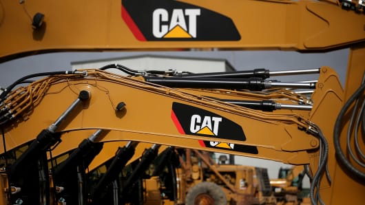 The CAT logo is displayed on Caterpillar construction equipment.