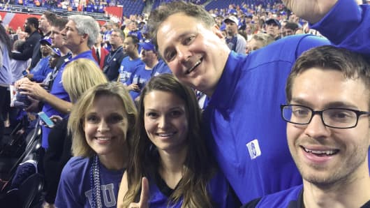 Steve Pagliuca and family cheer on Duke at the NCAA Men's Basketball National Championship game in Indianapolis on April 7, 2015.