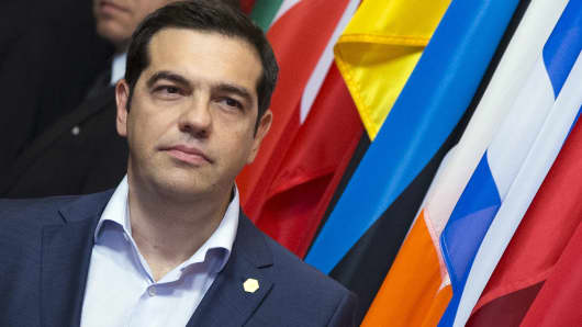 Greek Prime Minister Alexis Tsipras leaves the European Council headquarters after a summit in Brussels.