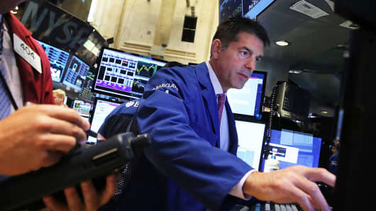 Traders on the floor of the New York Stock Exchange.