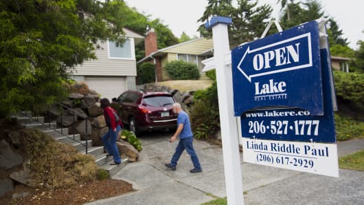 Potential homebuyers arrive to an open house in Seattle.
