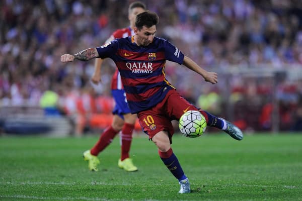 Lionel Messi of FC Barcelona shoots at goal during the La Liga match between Club Atletico de Madrid and FC Barcelona at Vicente Calderon Stadium on September 12, 2015 in Madrid, Spain.