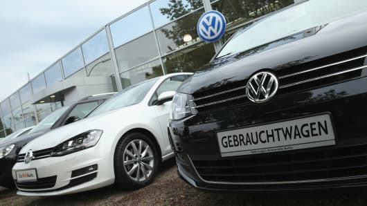 Used cars of German carmaker Volkswagen stand on display at a Volkswagen car dealership on September 22, 2015 in Berlin, Germany.
