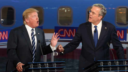 Republican presidential candidates Donald Trump (L) and Jeb Bush argue during the presidential debates on September 16, 2015 in Simi Valley, California.