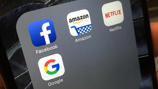 FANG (Facebook, Amazon, Netflix and Google) apps on a smartphone.