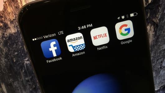FANG stocks (Facebook, Amazon, Netflix and Google) apps on a smartphone.