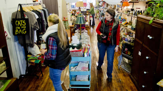 Sarah Wentworth and her mother Debbie, of Falmouth, look through Circa Home & Vintage on Congress Street as they shop on small business Saturday November 28, 2015.