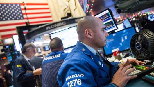A trader works on the floor of the New York Stock Exchange
