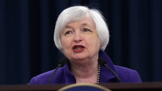 Federal Reserve Bank Chair Janet Yellen holds a news conference where she announced that the Fed will raise its benchmark interest rate for the first time since 2006 at the bank's Wilson Conference Center December 16, 2015 in Washington, DC.