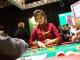 A dealer handles gaming chips at a baccarat table inside the Venetian Macau resort and casino, operated by Sands China Ltd., a unit of Las Vegas Sands Corp., in Macau, China.