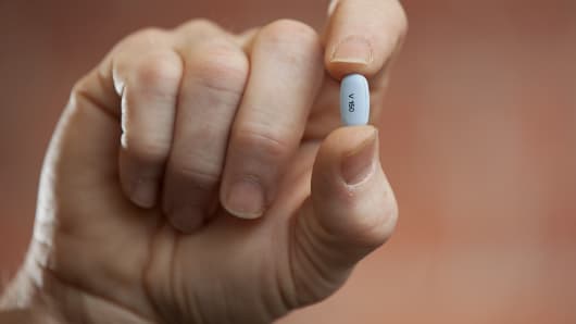 A Kalydeco pill, which is a medication for Cystic Fibrosis is made by Vertex Pharmaceuticals.